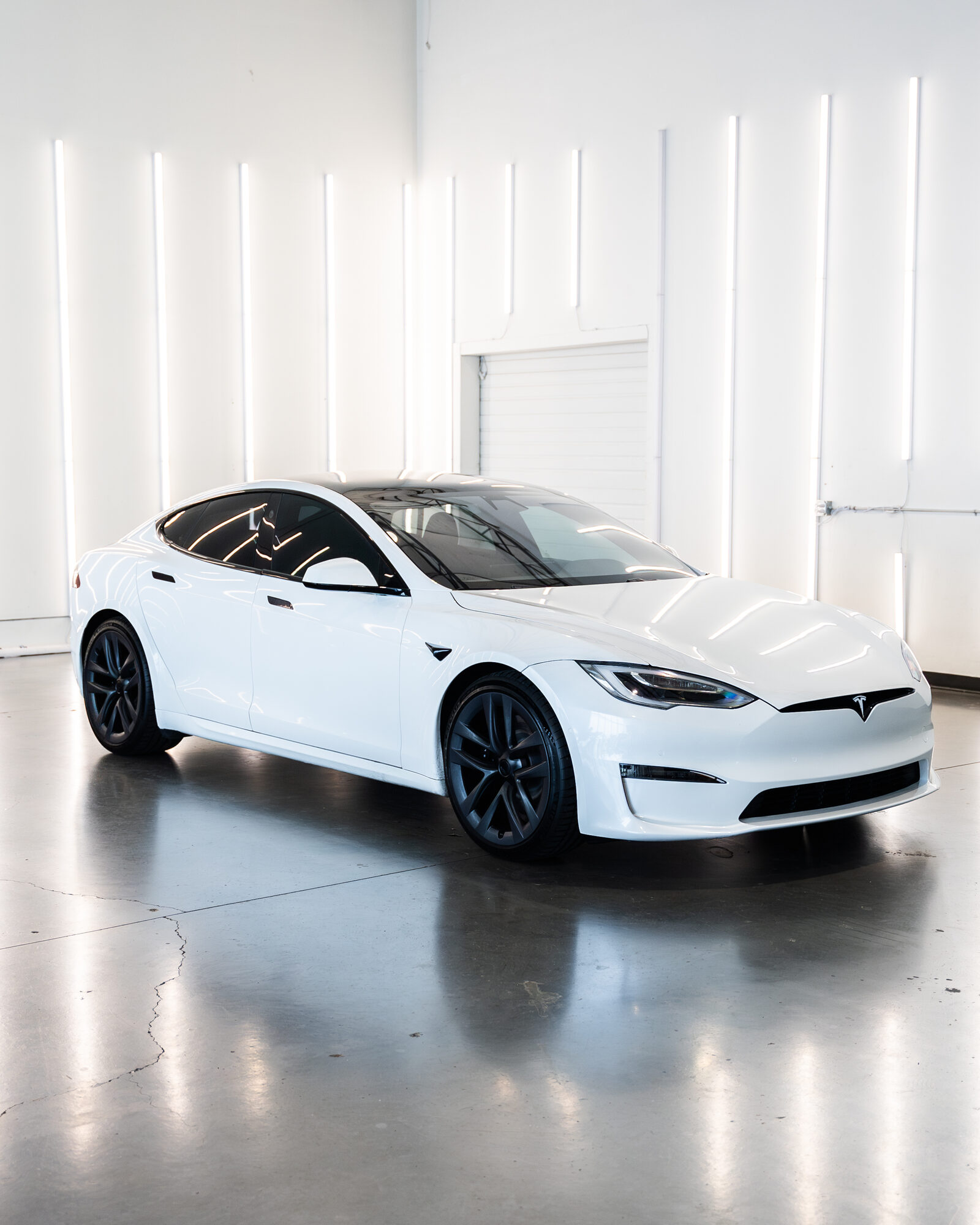 A white Tesla Model S in the Diplomat photo studio